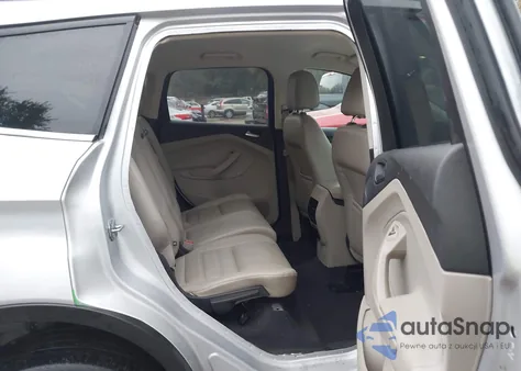 2017 Ford Escape Titanium z USA, uszkodzony, nr VIN 1FMCU0J90HUB80160